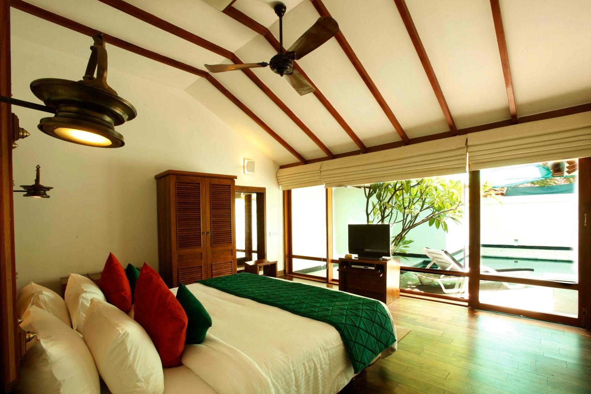 Heritage Madurai Ruang foto A bedroom at the resort