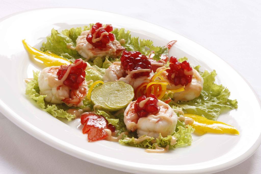 Heritage Madurai Bagian luar foto A salad of scallops