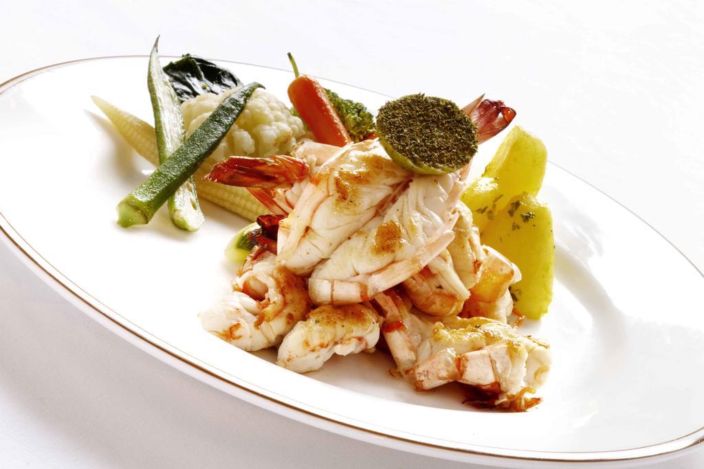 Heritage Madurai Bagian luar foto A prepared crab