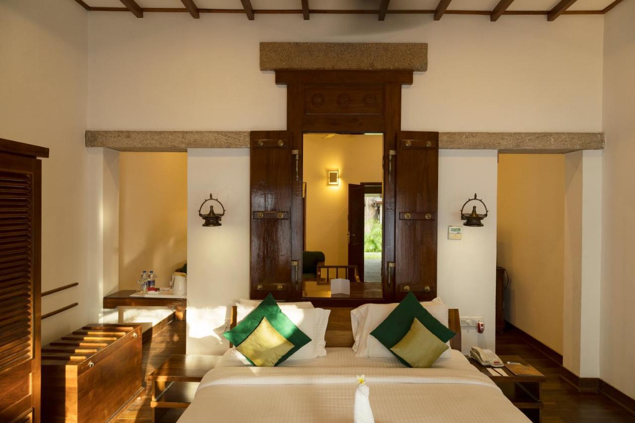 Heritage Madurai Bagian luar foto A bedroom at the resort